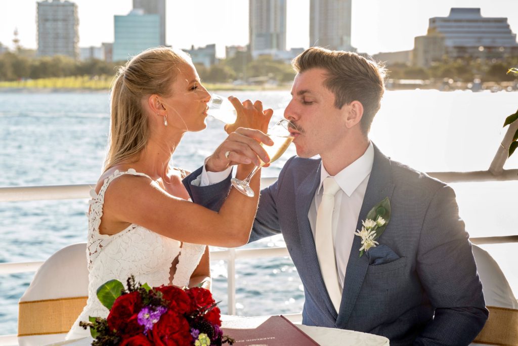 gold coast cruises pop-up wedding glass of bubbles